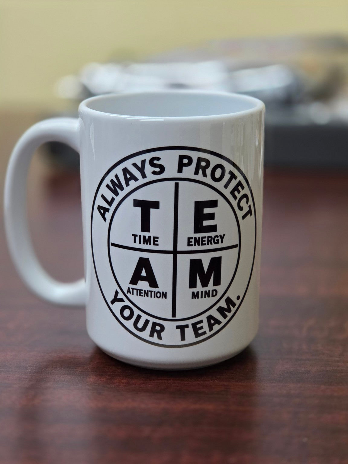 Always Protect Your T.E.A.M. 15 oz white ceramic mug with Time Energy Attention Mind design