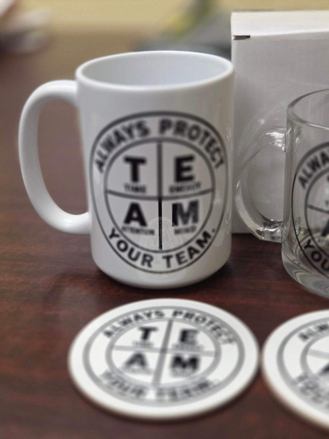 Always Protect Your T.E.A.M. white ceramic mug lifestyle photo