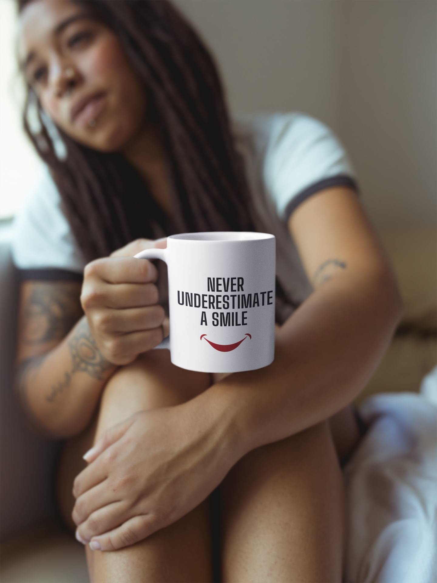 Never Underestimate a Smile Mug/Tumbler